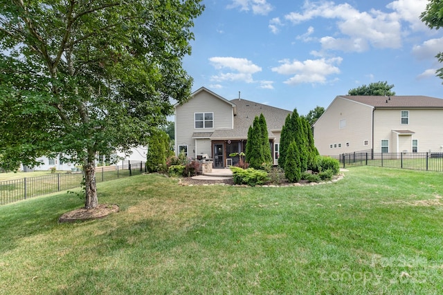 217 Fielding St, Mount Holly, NC 28120 - back of house featuring a patio, a fenced backyard, and roof with shingles