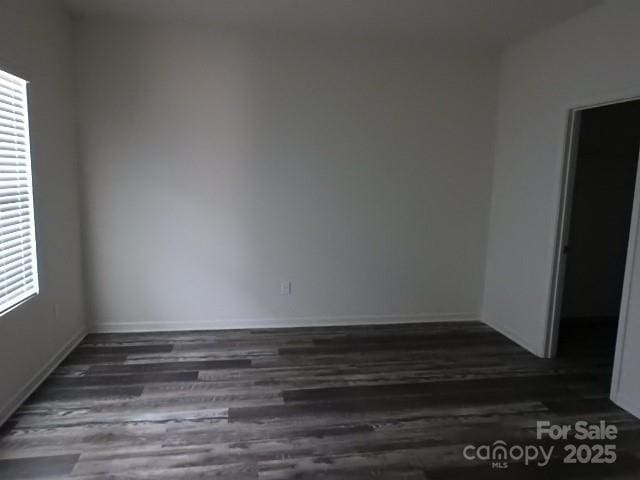 252 Mills Ave, Troutman, NC 28166 - unfurnished room featuring wood finished floors and healthy amount of natural light