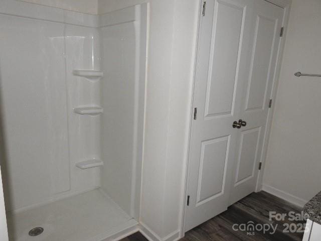 252 Mills Ave, Troutman, NC 28166 - full bathroom with a shower stall and wood finished floors