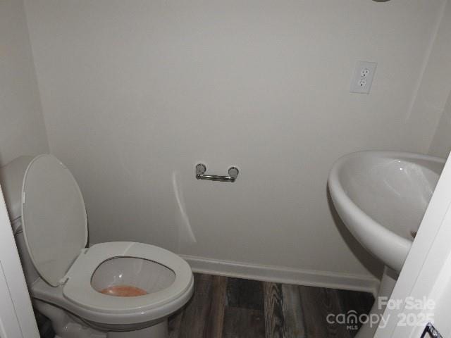 260 Mills Ave, Troutman, NC 28166 - bathroom featuring wood finished floors and toilet