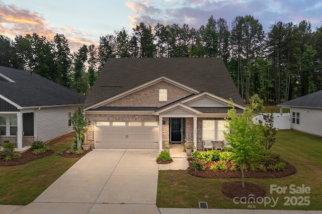 9021 Myrna Dr, Gastonia, NC 28056 - craftsman-style house with driveway, a garage, brick siding, a front lawn, and a porch