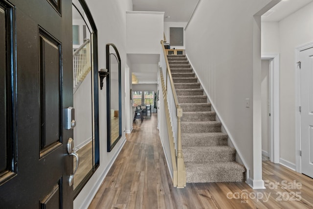 9021 Myrna Dr, Gastonia, NC 28056 - foyer with stairs and wood finished floors