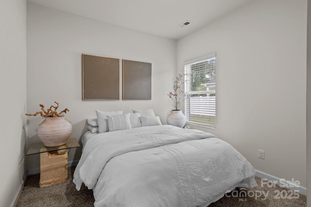 9021 Myrna Dr, Gastonia, NC 28056 - carpeted bedroom featuring baseboards