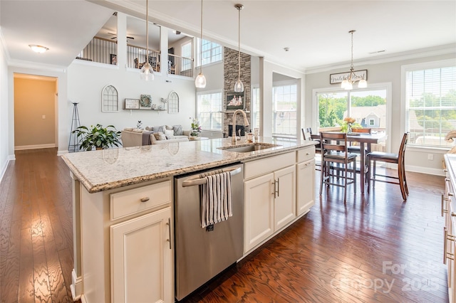 208 Canoe Pole Ln, Mooresville, NC 28117 - kitchen with stainless steel dishwasher, healthy amount of natural light, dark wood-style flooring, light stone countertops, and ornamental molding