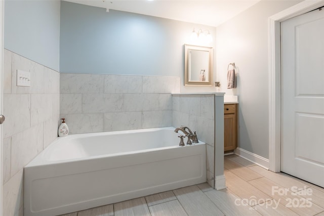 208 Canoe Pole Ln, Mooresville, NC 28117 - full bathroom with vanity and a garden tub