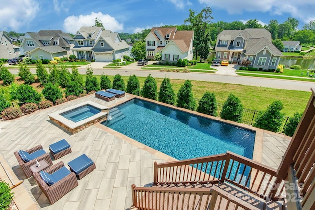 208 Canoe Pole Ln, Mooresville, NC 28117 - view of pool with a residential view, a pool with connected hot tub, and a patio area
