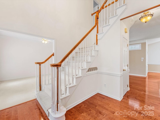 15139 Wiltshire Manor Dr, Charlotte, NC 28278 - stairs featuring wood finished floors and baseboards