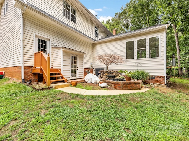 15139 Wiltshire Manor Dr, Charlotte, NC 28278 - back of property with crawl space and a yard