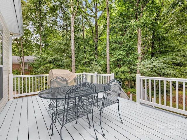 15139 Wiltshire Manor Dr, Charlotte, NC 28278 - wooden terrace with outdoor dining area