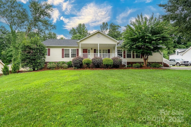 1408 Wildwood Dr, Kannapolis, NC 28081 - ranch-style house featuring covered porch and a front lawn