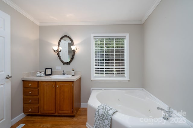1408 Wildwood Dr, Kannapolis, NC 28081 - bathroom with vanity, a whirlpool tub, crown molding, and wood finished floors