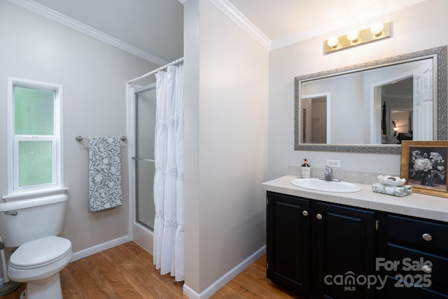 1408 Wildwood Dr, Kannapolis, NC 28081 - full bathroom featuring ornamental molding, wood finished floors, vanity, and shower / bath combo with shower curtain