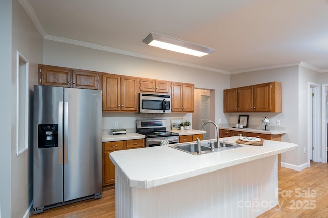 1408 Wildwood Dr, Kannapolis, NC 28081 - kitchen with appliances with stainless steel finishes, light wood-type flooring, ornamental molding, light countertops, and brown cabinetry