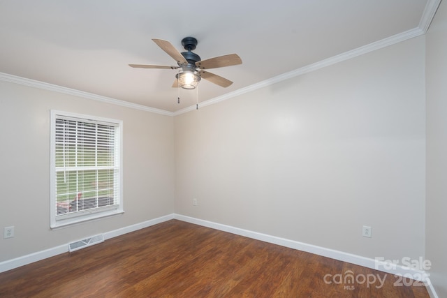 1408 Wildwood Dr, Kannapolis, NC 28081 - spare room featuring ornamental molding, dark wood-style flooring, and ceiling fan