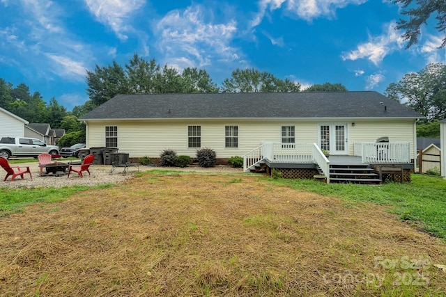 1408 Wildwood Dr, Kannapolis, NC 28081 - back of property featuring a deck, a yard, an outdoor fire pit, and a shingled roof
