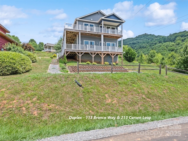 113 Bronco Way, Waynesville, NC 28785 - view of front of property with a wooden deck and a balcony