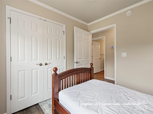 113 Bronco Way, Waynesville, NC 28785 - bedroom with dark wood-style flooring, a closet, and crown molding