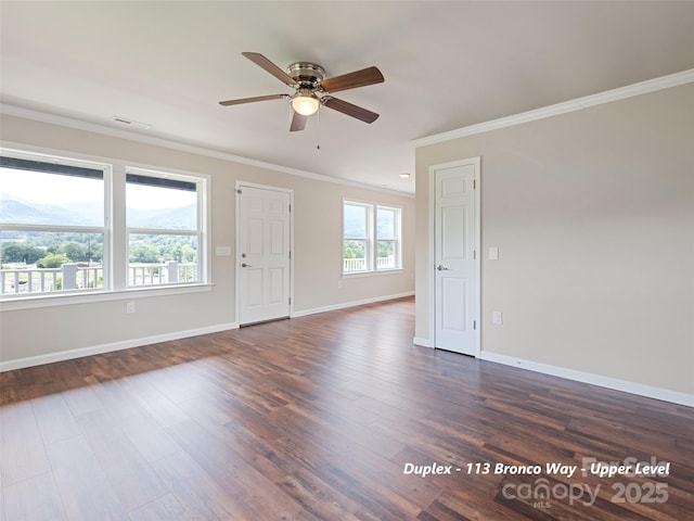 113 Bronco Way, Waynesville, NC 28785 - empty room with a ceiling fan, crown molding, and dark wood finished floors