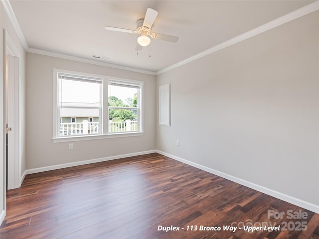 113 Bronco Way, Waynesville, NC 28785 - spare room featuring dark wood-style floors, ornamental molding, and ceiling fan