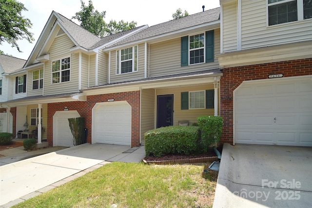 2620 Brackley Pl NW, Concord, NC 28027 - traditional-style house with an attached garage, brick siding, driveway, and a shingled roof