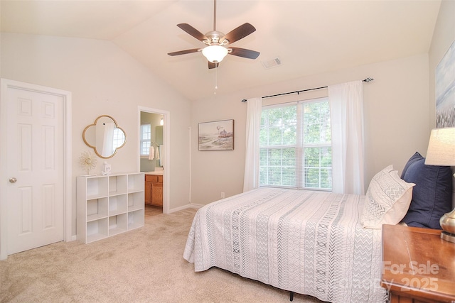 2620 Brackley Pl NW, Concord, NC 28027 - bedroom with vaulted ceiling, light carpet, ceiling fan, and ensuite bath