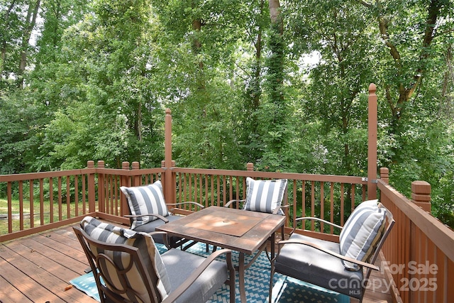 2620 Brackley Pl NW, Concord, NC 28027 - wooden deck featuring outdoor dining area