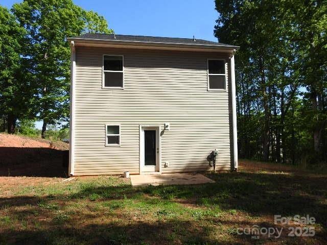 118 Carrisa Ln, Troutman, NC 28166 - back of house with a patio