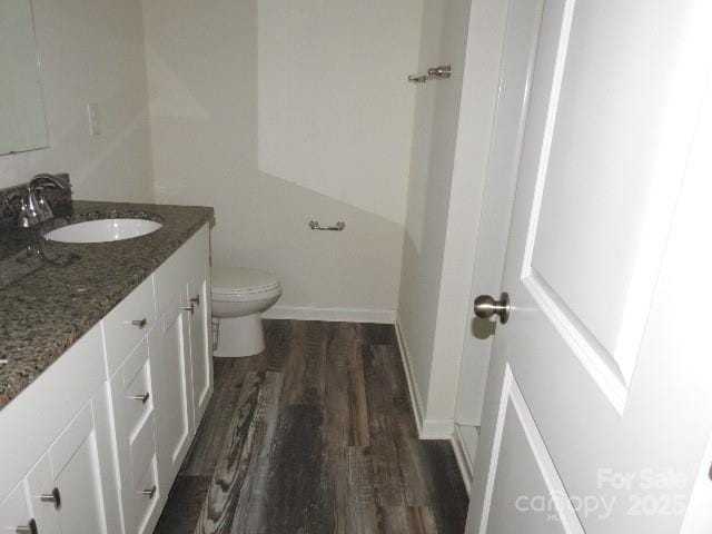 118 Carrisa Ln, Troutman, NC 28166 - bathroom with vanity and wood finished floors