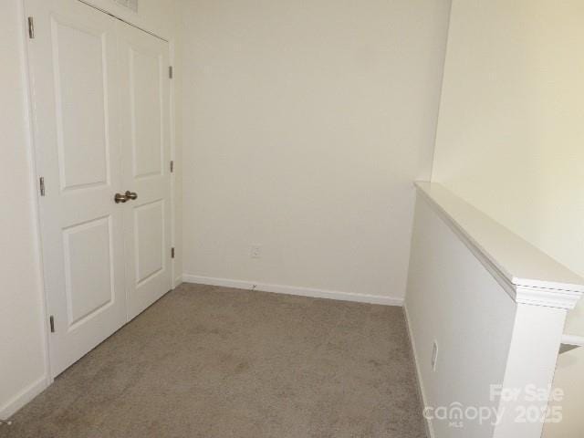 118 Carrisa Ln, Troutman, NC 28166 - interior space featuring light carpet and baseboards