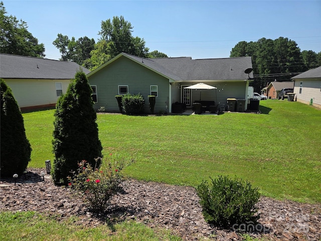 1300 Bethpage Rd, Kannapolis, NC 28081 - rear view of house with a yard