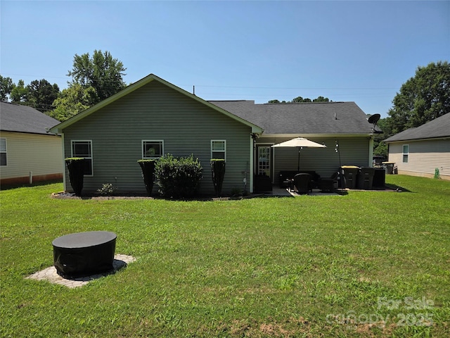1300 Bethpage Rd, Kannapolis, NC 28081 - rear view of property featuring a yard and a patio area
