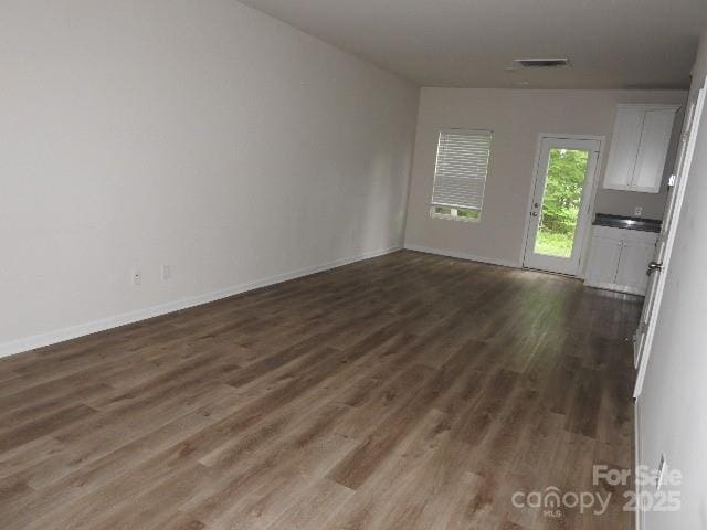 103 Spring Dr, Salisbury, NC 28144 - unfurnished room featuring wood finished floors and baseboards