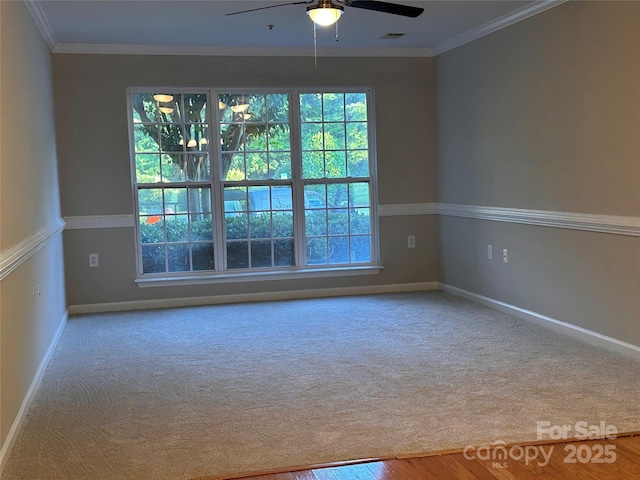 5236 Hilltop Rd, Jamestown, NC 27282 - carpeted empty room with a ceiling fan and ornamental molding