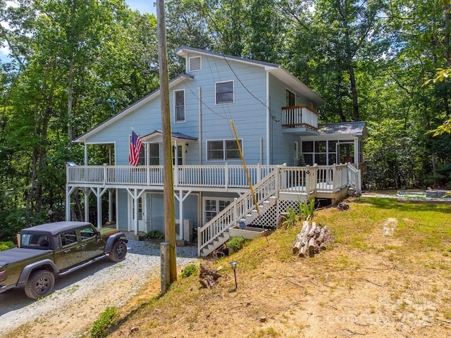155 Notta Rd, Franklin, NC 28734 - view of front of house with a balcony, stairs, a wooden deck, and driveway