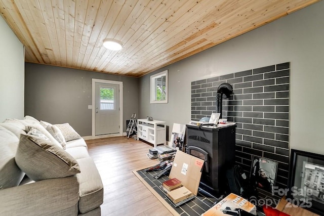 155 Notta Rd, Franklin, NC 28734 - living area featuring wood ceiling, a wood stove, and wood finished floors