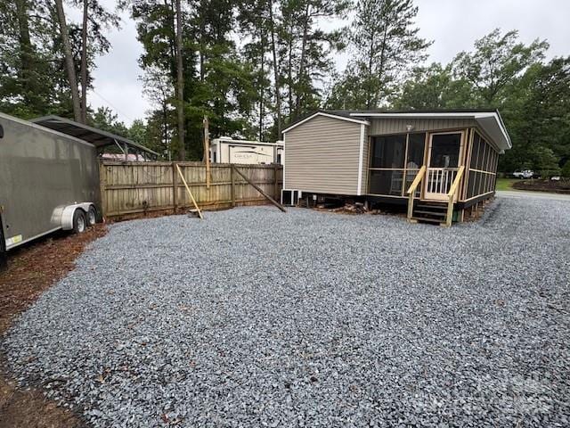 103 Holly Harbor Trl Unit 348A, Mount Gilead, NC 27306 - view of side of property with a sunroom
