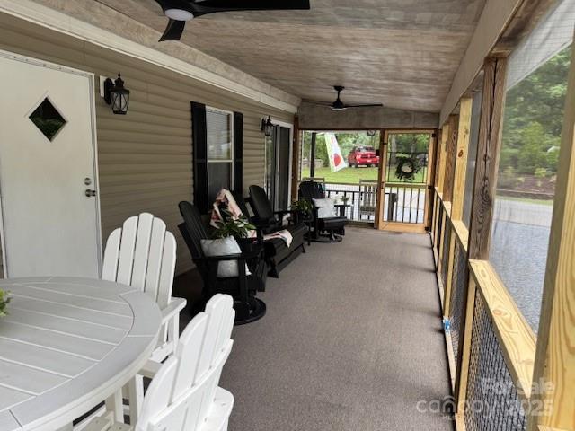 103 Holly Harbor Trl Unit 348A, Mount Gilead, NC 27306 - sunroom / solarium with ceiling fan and vaulted ceiling