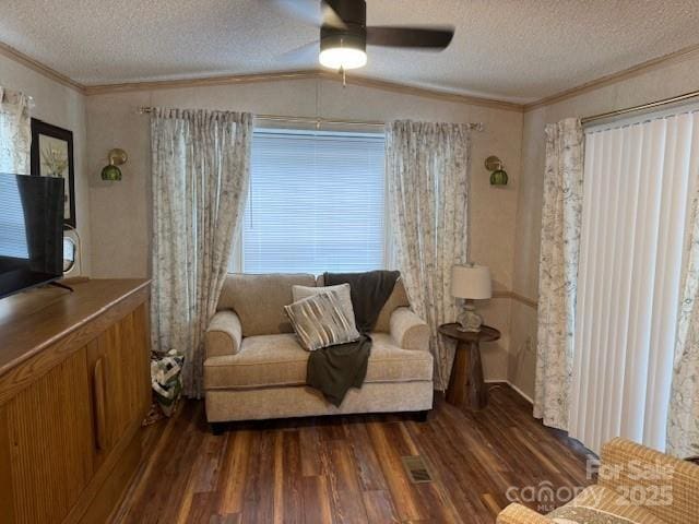 103 Holly Harbor Trl Unit 348A, Mount Gilead, NC 27306 - living room featuring ornamental molding, wood finished floors, a textured ceiling, a ceiling fan, and vaulted ceiling