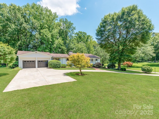 607 W School St, Maiden, NC 28650 - ranch-style home with driveway, a garage, and a front lawn