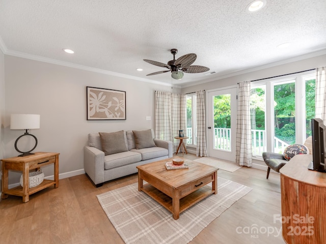 607 W School St, Maiden, NC 28650 - living area with a textured ceiling, crown molding, ceiling fan, light wood-style flooring, and recessed lighting