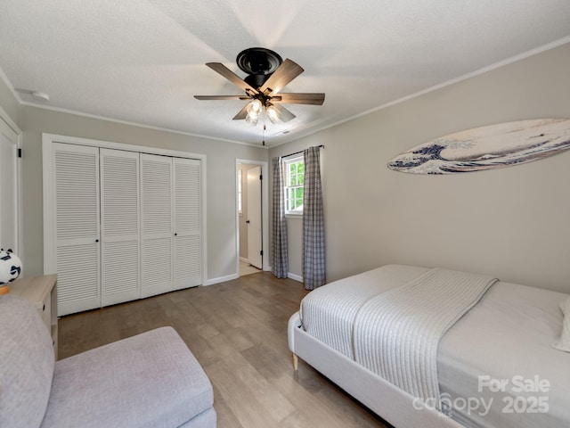 607 W School St, Maiden, NC 28650 - bedroom featuring wood finished floors, a closet, ceiling fan, and crown molding