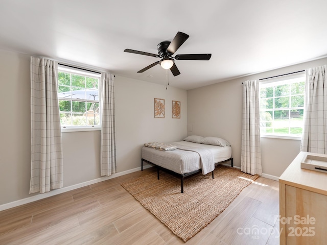 607 W School St, Maiden, NC 28650 - bedroom featuring light wood finished floors and a ceiling fan