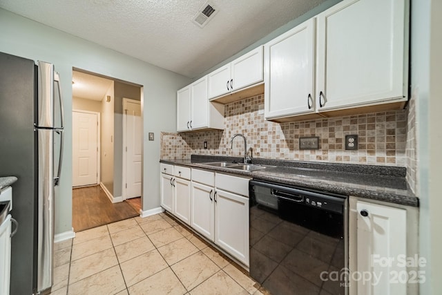 8027 Sherington Way, Charlotte, NC 28227 - kitchen featuring black dishwasher, dark countertops, freestanding refrigerator, backsplash, and a textured ceiling