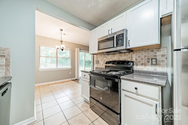 8027 Sherington Way, Charlotte, NC 28227 - kitchen featuring stainless steel microwave, black / electric stove, freestanding refrigerator, dishwasher, and backsplash
