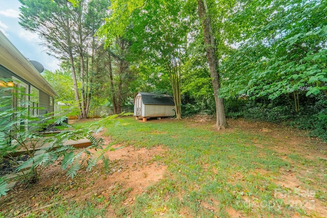 8027 Sherington Way, Charlotte, NC 28227 - view of yard featuring a storage unit