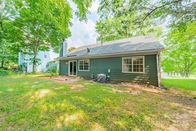8027 Sherington Way, Charlotte, NC 28227 - rear view of property with a yard, a patio area, and a chimney