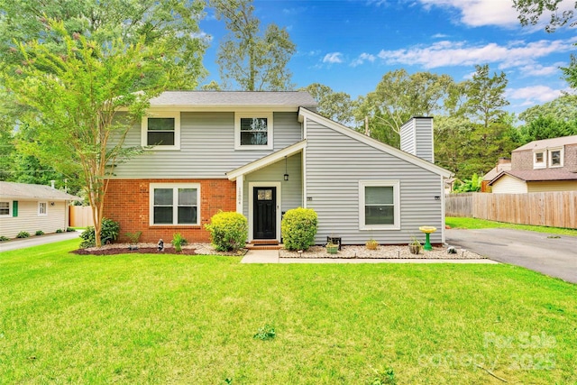 15804 Fairfield Dr, Matthews, NC 28104 - view of front of property with a chimney and brick siding