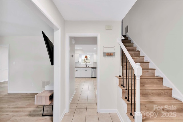15804 Fairfield Dr, Matthews, NC 28104 - stairway with tile patterned flooring and baseboards