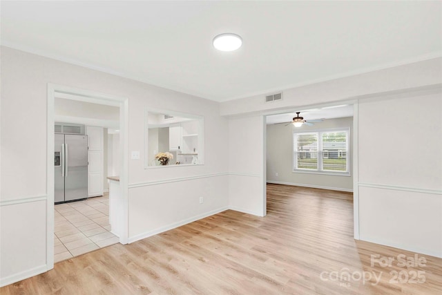 15804 Fairfield Dr, Matthews, NC 28104 - unfurnished room featuring a ceiling fan and light wood-type flooring