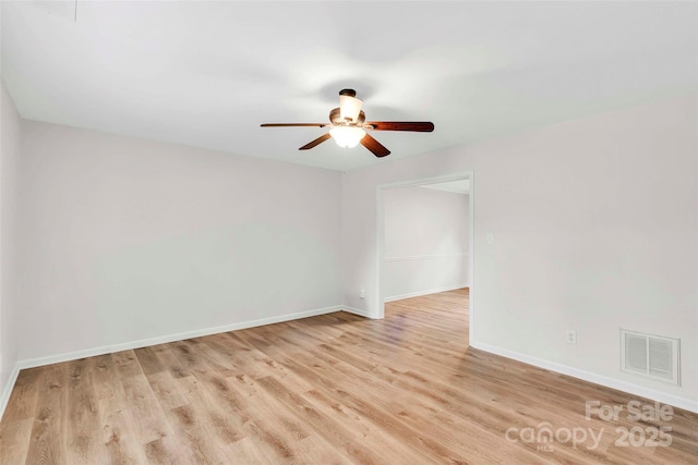 15804 Fairfield Dr, Matthews, NC 28104 - spare room with a ceiling fan and light wood-style floors